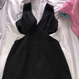 Black mini dress with small slit